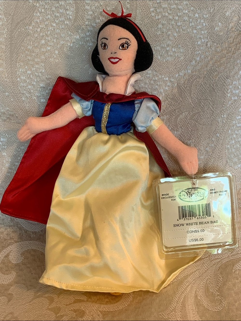 Disney Snow White Bean Bag tags with plastic covers.